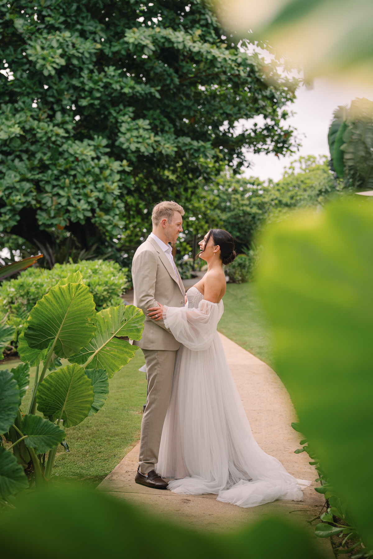 A bride and groom at 1 Hotel Hanalei Bay during their Kauai elopement.