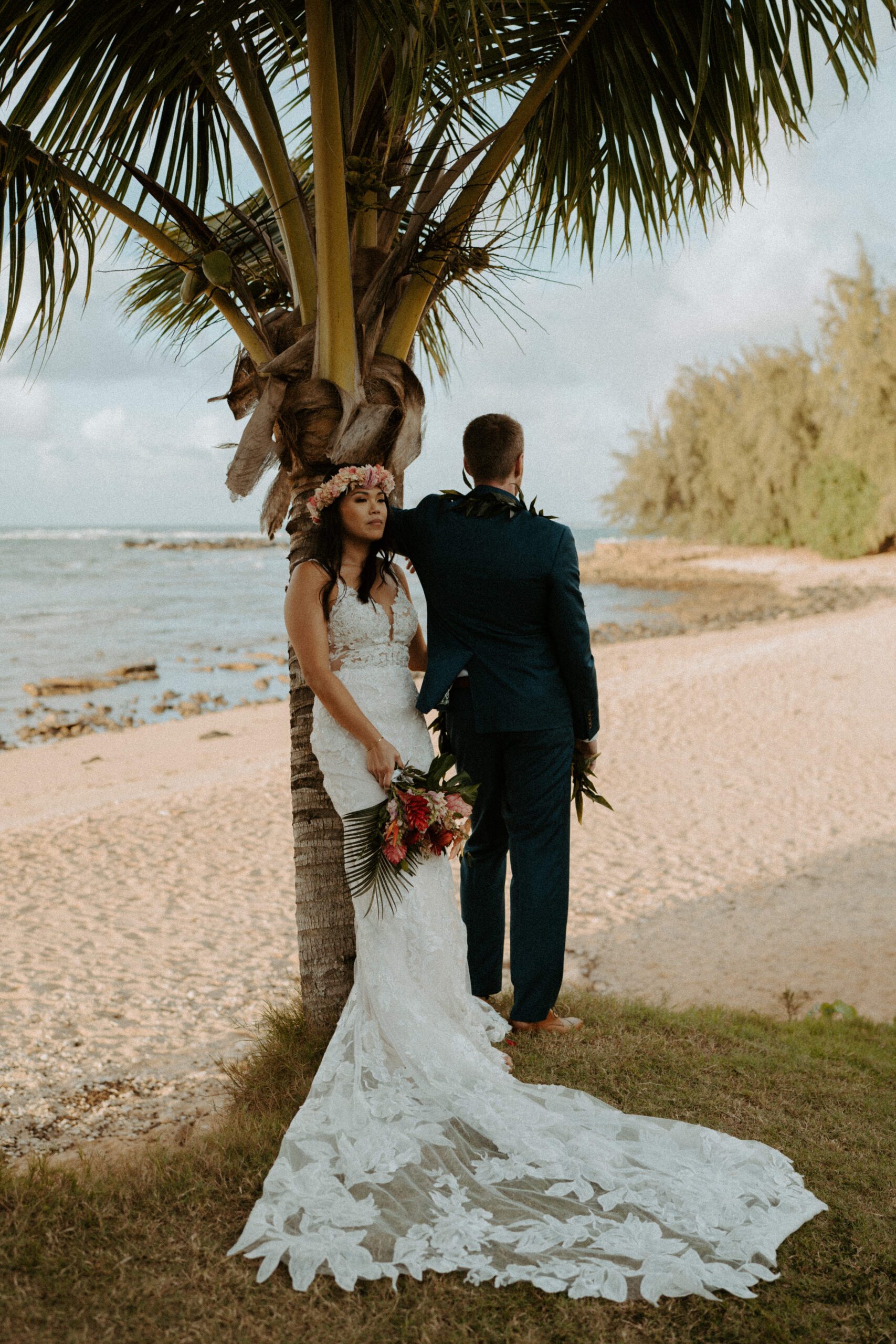 Masha Sakhno is a destination wedding photographer and captured a tropical wedding at Loulu Palm Farm Estate.