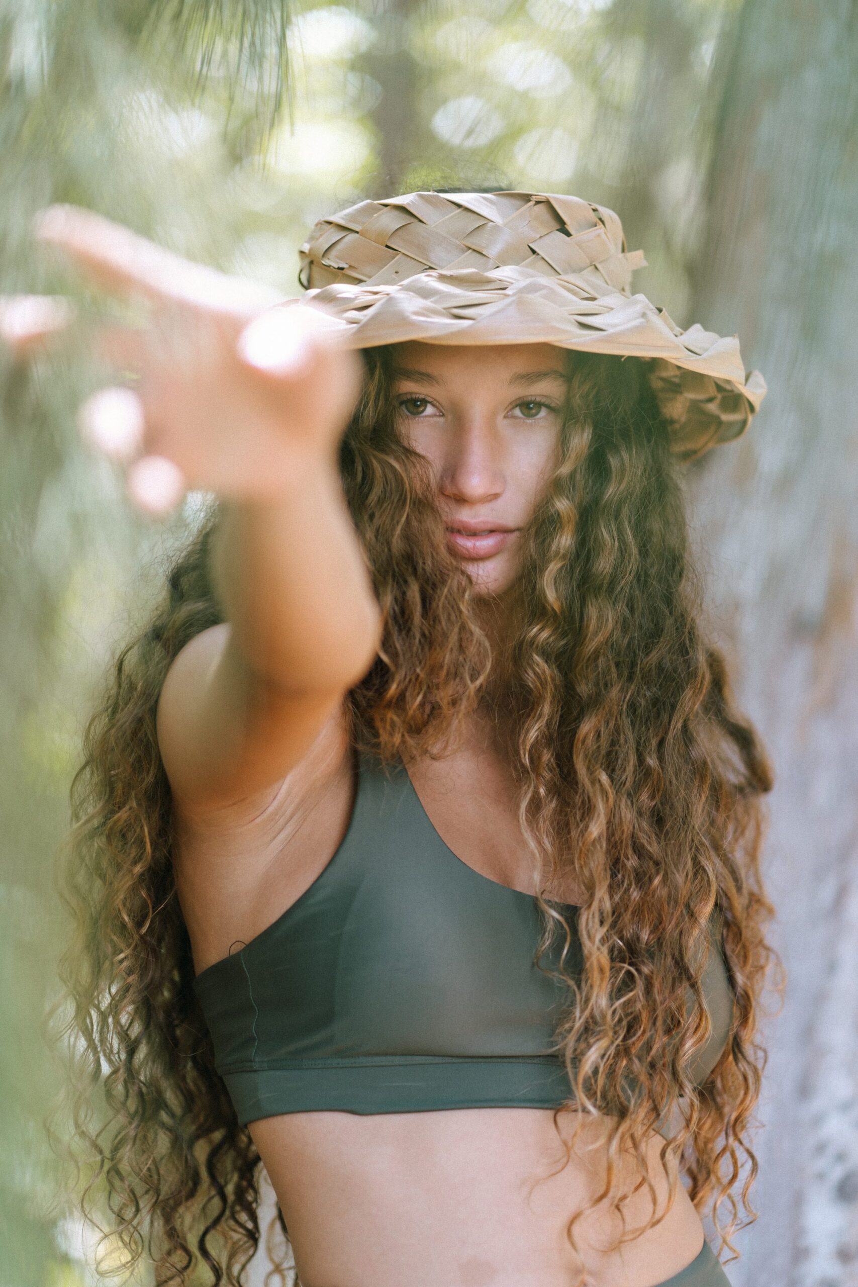 Oahu branding photographer Masha Sakhno Photo captures a model in sustainable activewear.
