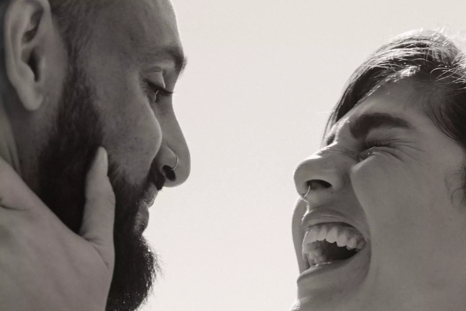 Black and white portrait of bride and groom after wedding ceremony.