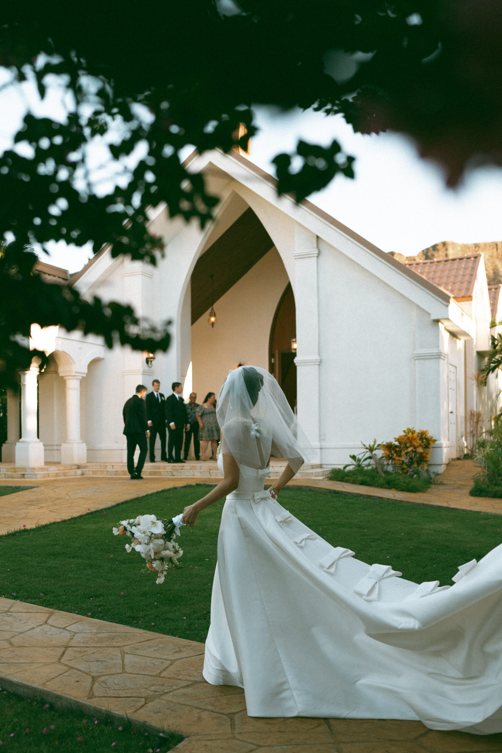 Bride immediately after wedding ceremony in front of church.