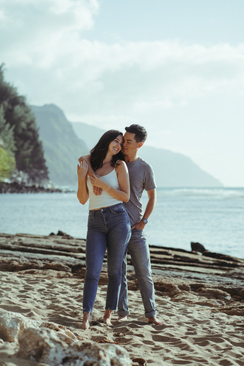 Couple opts for comfort and wears jeans and t-shirt during their engagement session.