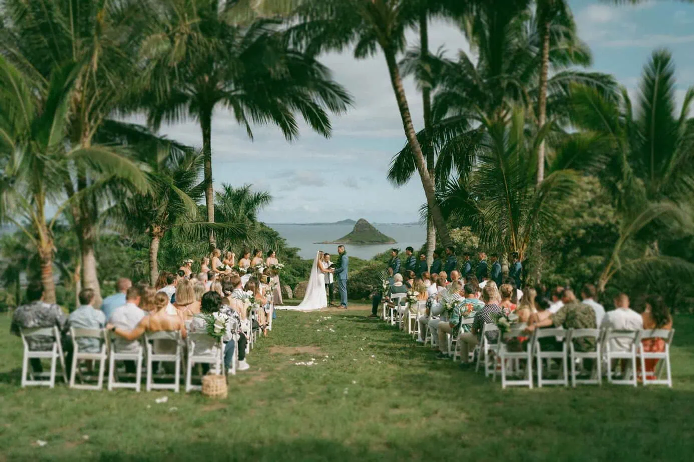 a wedding ceremony in the middle of a tropical setting