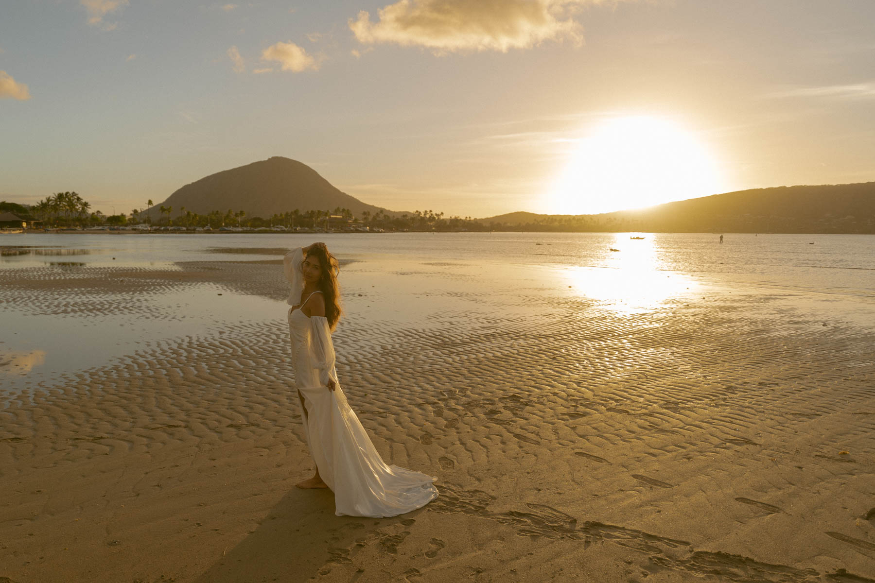 A bride during sunrise in Oahu.