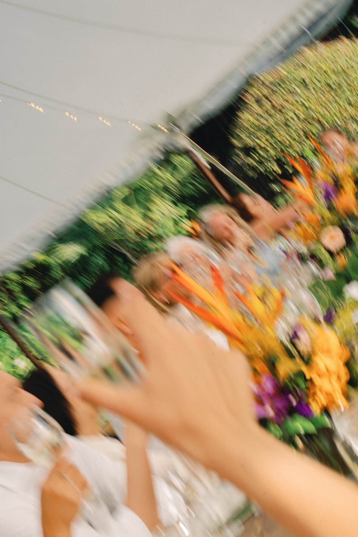 An intimate wedding reception during speeches.