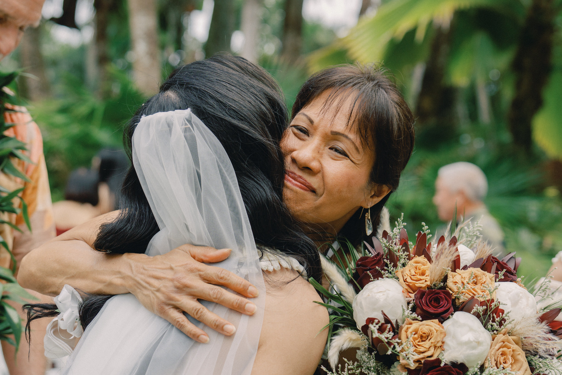 Warm embrace during an Oahu wedding.