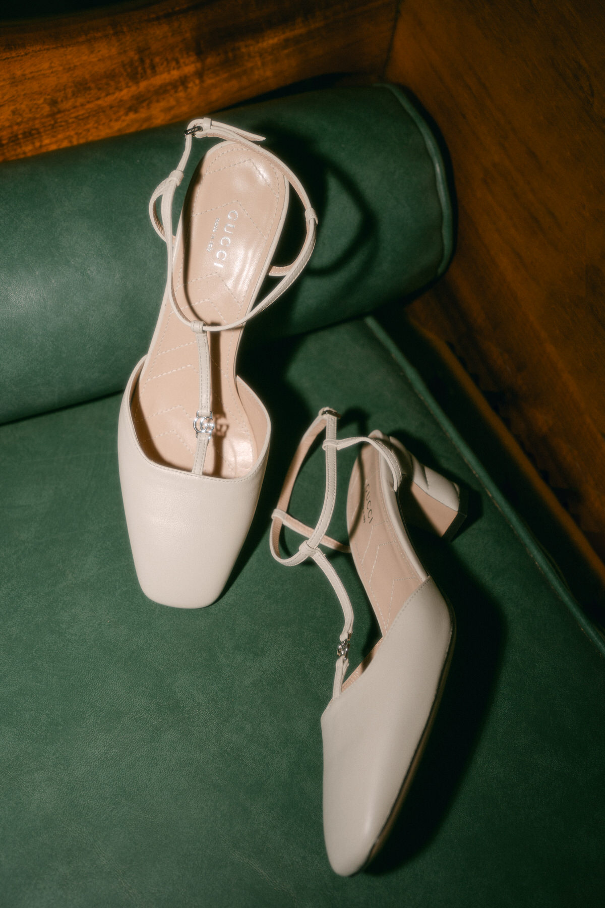 A close up of Gucci wedding shoes.