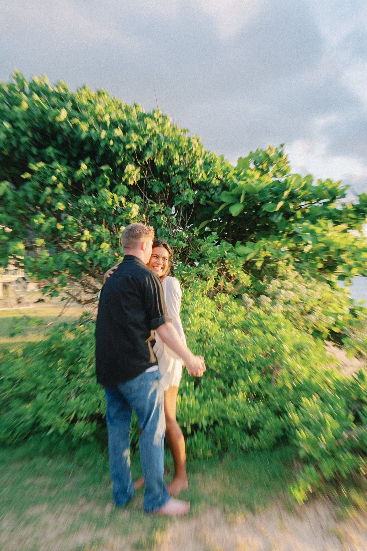 A couple at Kualoa Regional Park during  their Oahu engagement session.