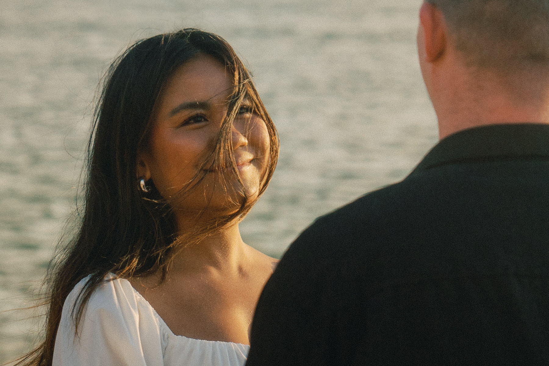 A couple at Kualoa Regional Park during  their Oahu engagement session.