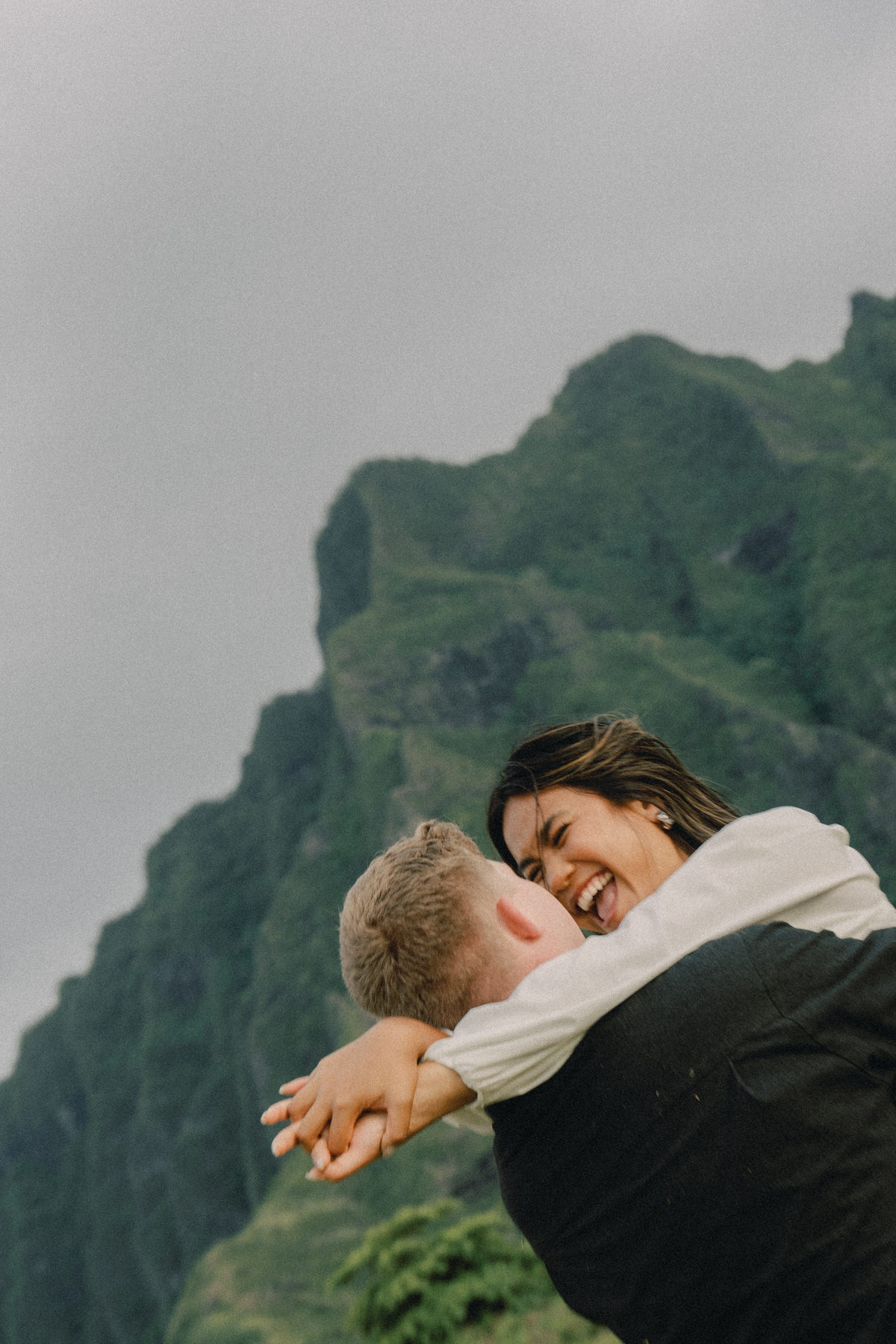 A couple at Kualoa Regional Park during  their Oahu engagement session.