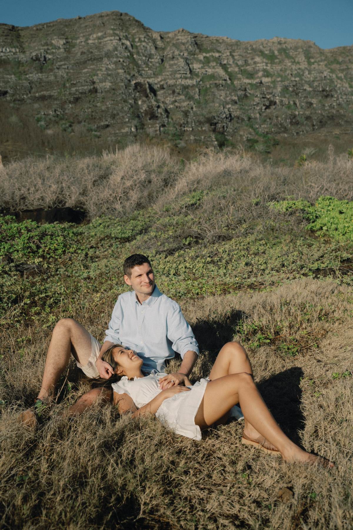 Couple at Makapu'u Beach during their engagement session on Oahu.