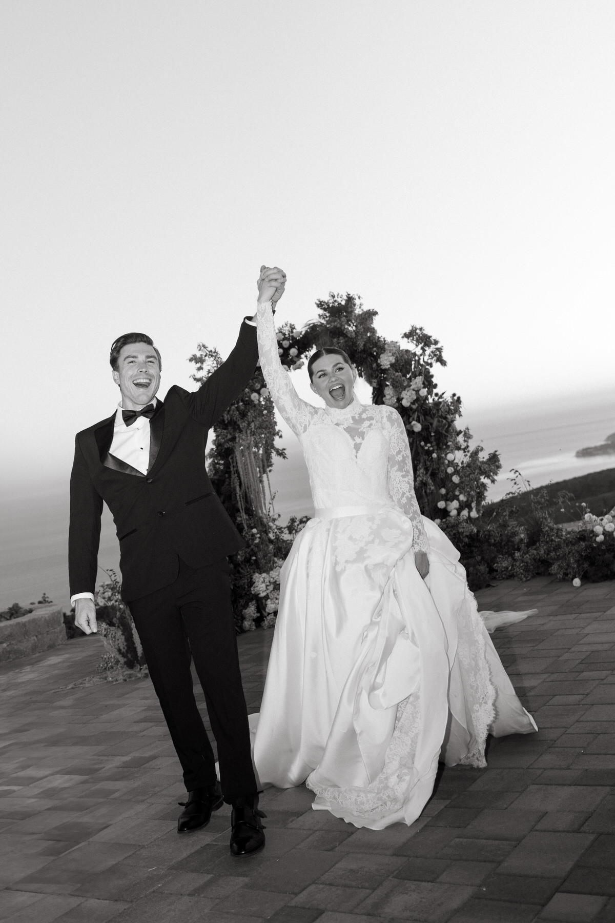 A couple celebrating at the Grand View Malibu.