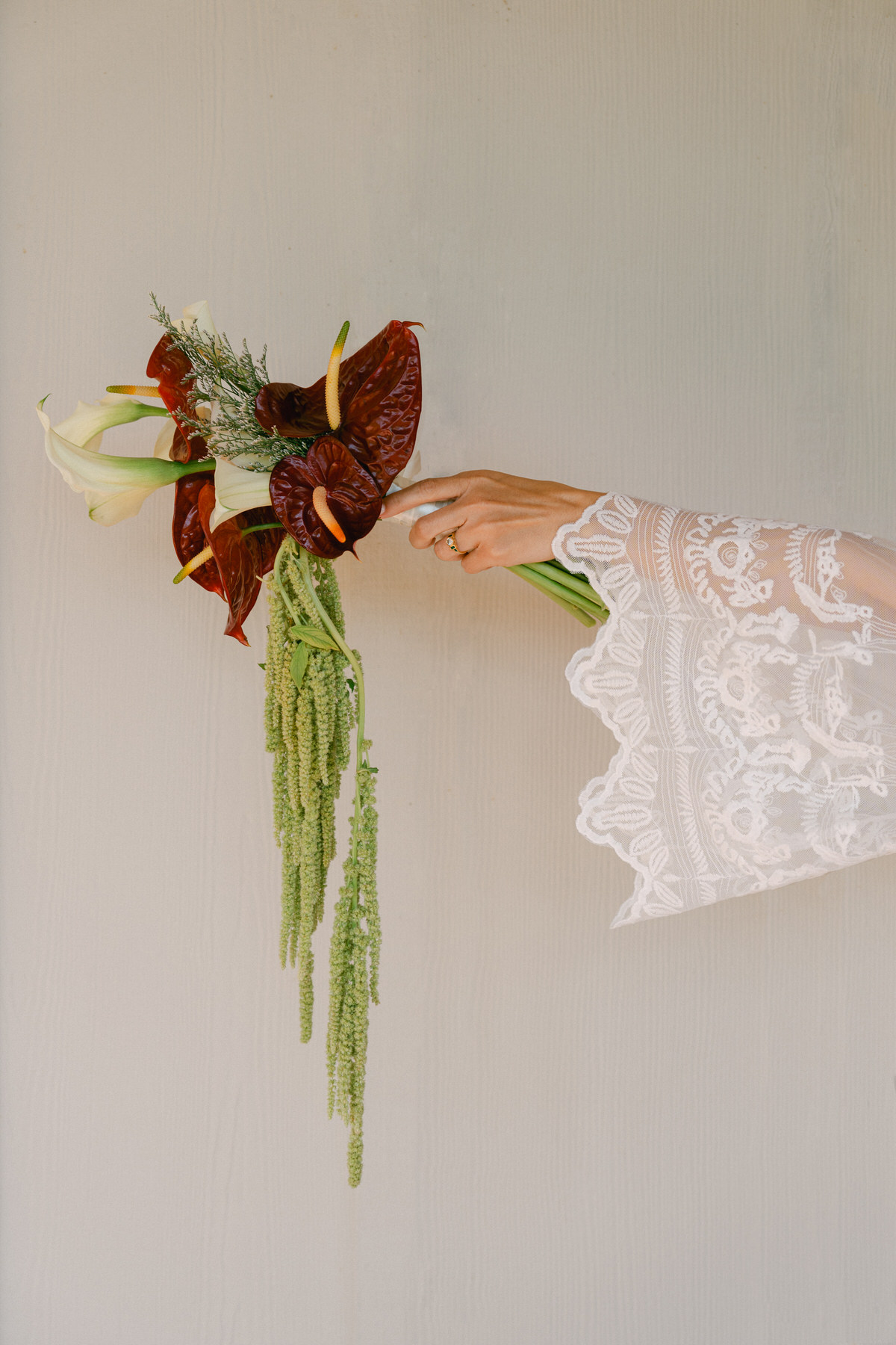 One of the best Oahu wedding florists creates stunning bridal bouquet.