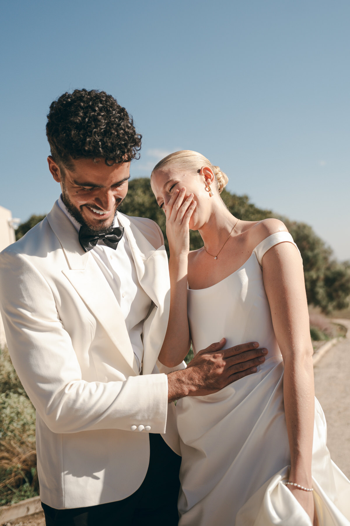 Couple laughs before saying their vows.