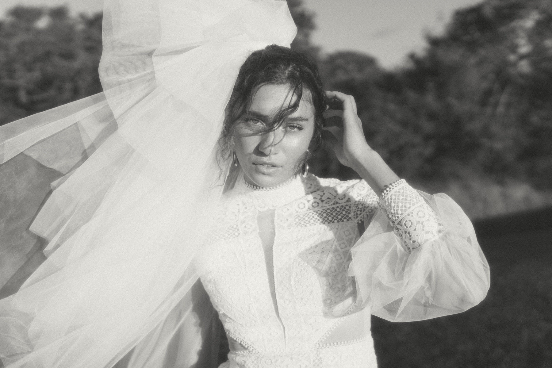 Elegant bridal portrait with an ocean backdrop in Oahu