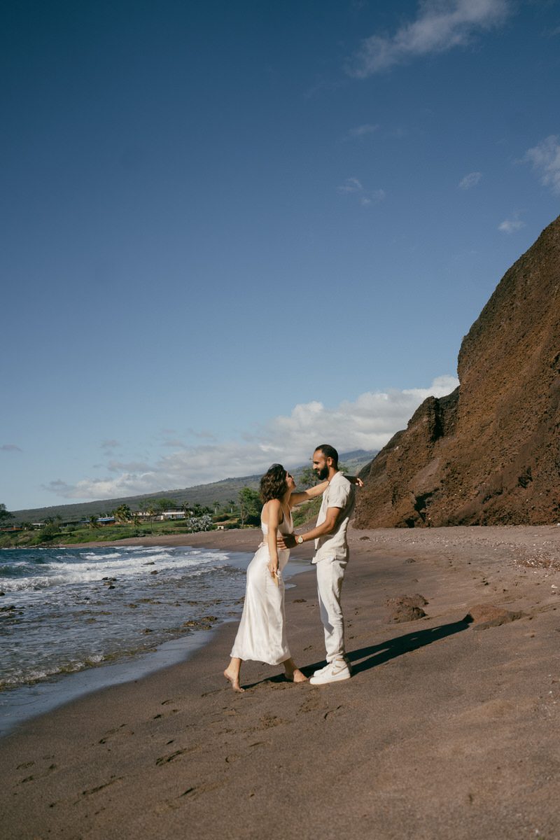 Dreamy Hawaii elopement photo with lush green mountains