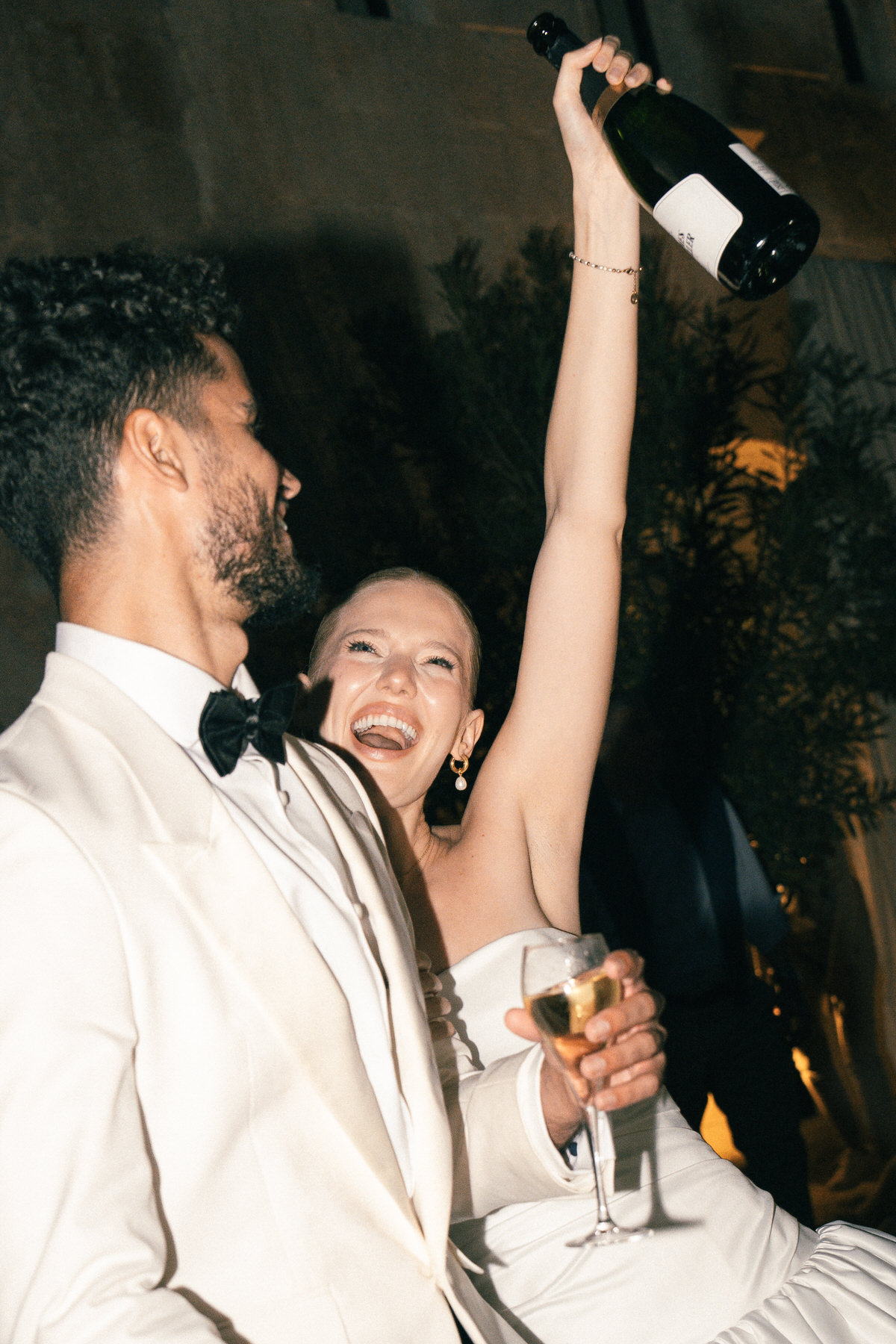Bride and groom enjoying wedding reception at the Leahi room & Lanai by Deck in Honolulu.