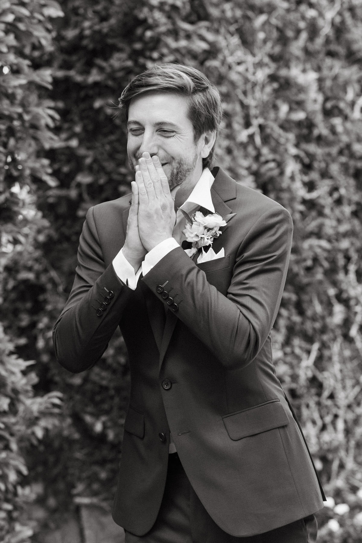 The groom reacts emotionally, hands to his face, during the first look—raw, heartfelt moments from La Pietra Wedding: A Guide for Modern Couples.