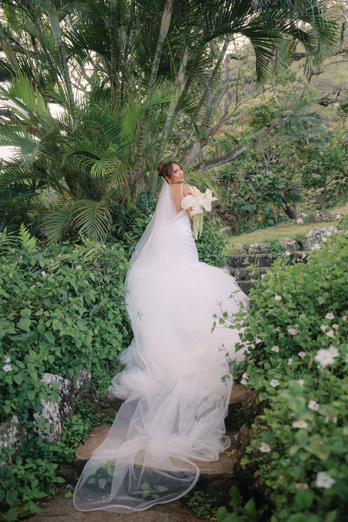 Oahu wedding vendors created a beautiful wedding at Kualoa Ranch.