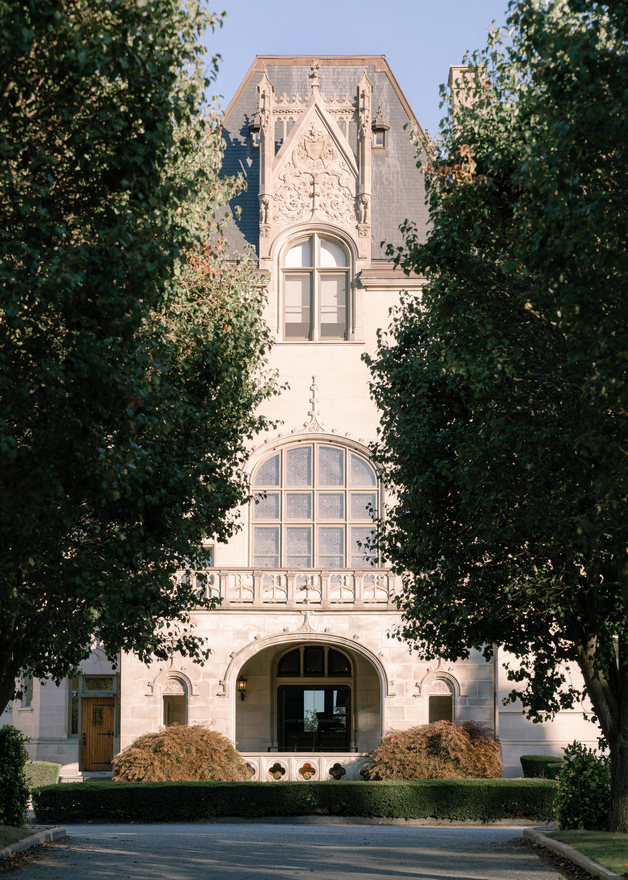 The stunning exterior of Ochre Court Newport, the grand venue for the elegant brunch wedding celebration.