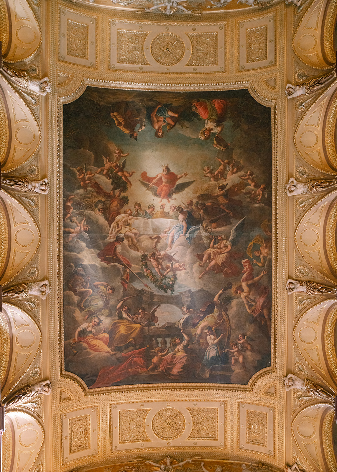 A stunning view of the ceiling artwork at the brunch wedding at Ochre Court Newport, showcasing intricate, classical artwork above the grand reception space.