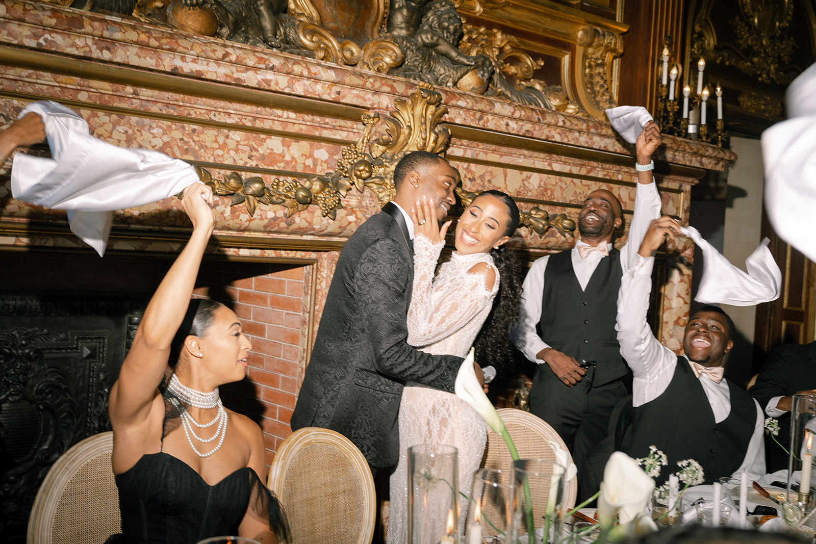 Guests celebrating joyfully at the reception during the Brunch Wedding at Ochre Court Newport, with laughter and excitement filling the air.