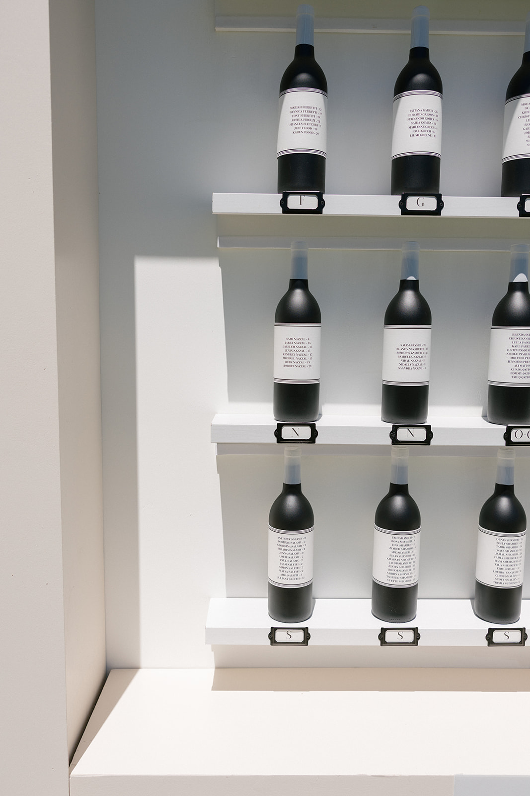 Wine bottles displayed on white shelving at Silverado Resort in Napa.